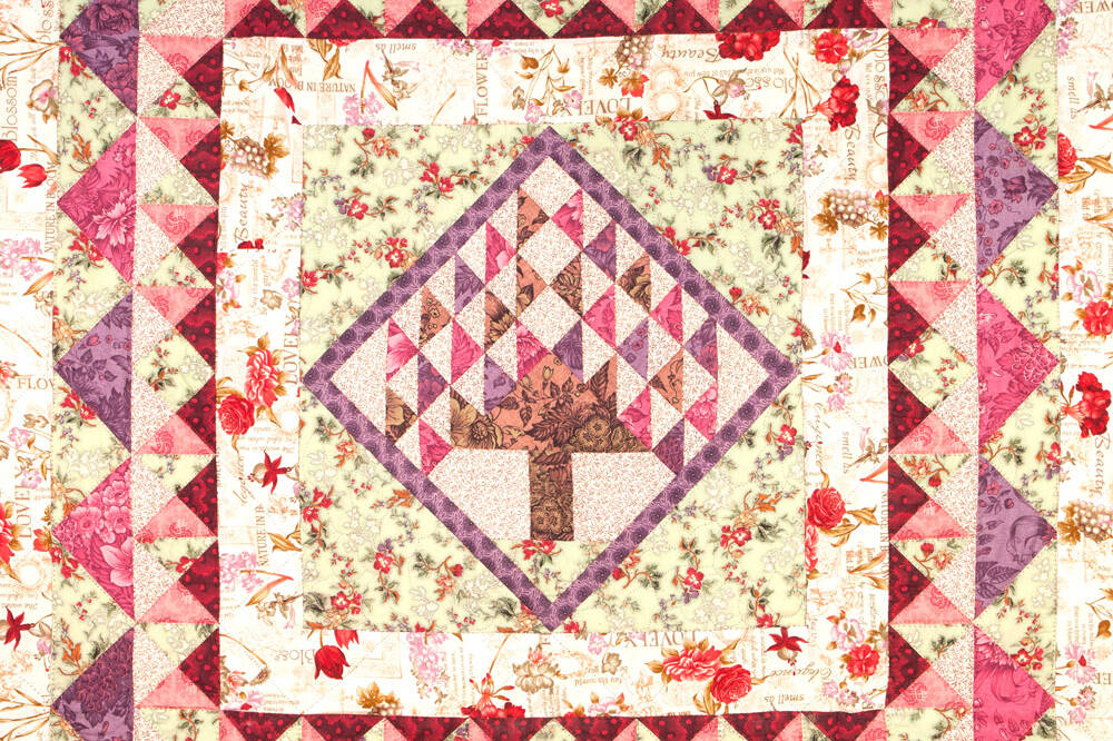 Sewing a patchwork quilt